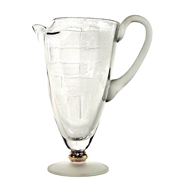 Gorgeous mid century glass pitcher. Minimalist design and optic gold ball is perfect and undamaged. Optic Glass Pitcher,...