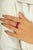 Make a bold statement with this vibrant ring, crafted in luminous 14K white gold. Featuring a striking row of radiant pink...