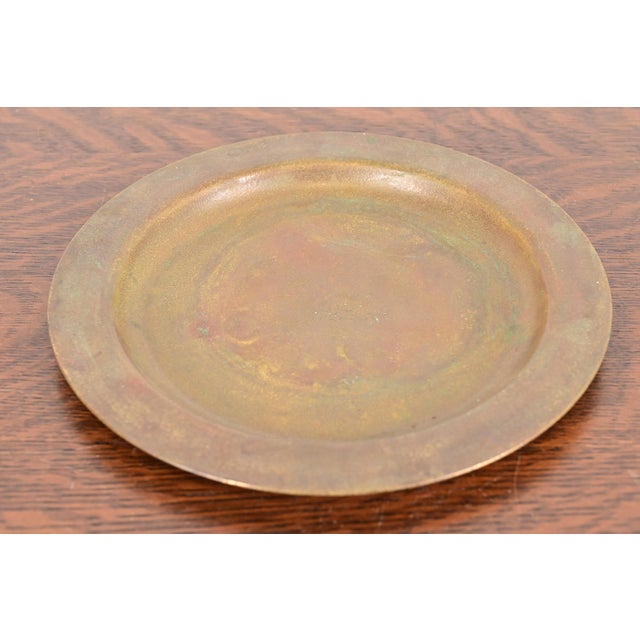 A gorgeous Arts & Crafts or Art Deco period bronze charger plate or serving tray By Tiffany Studios (signed to the...