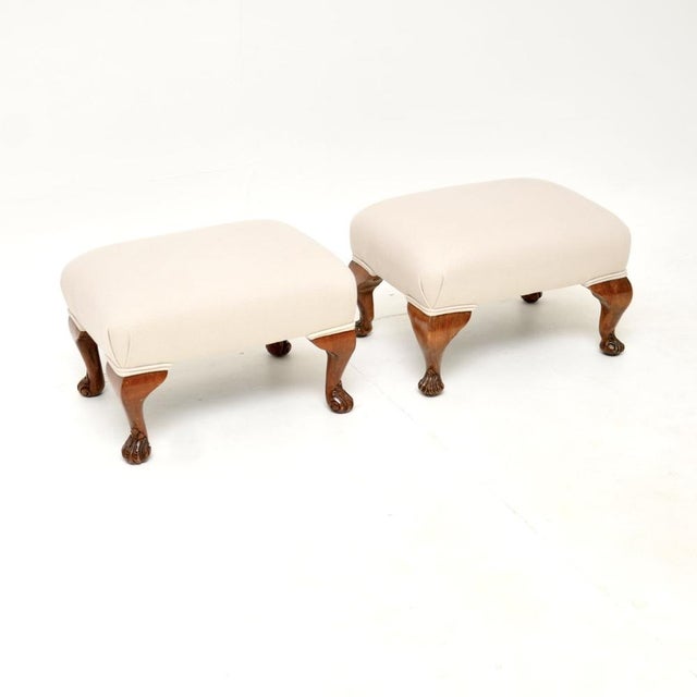 A beautiful pair of antique walnut foot stools. They were made in England, and date from around the 1930’s. The quality is...