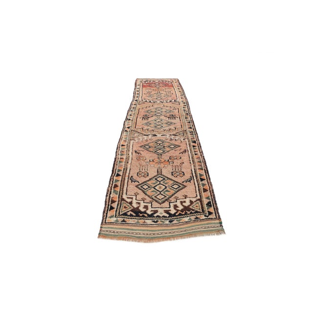 Handknotted vintage decorative Herki runner from Northern Iraq. Approximately 50-60 years old. In very good condition.