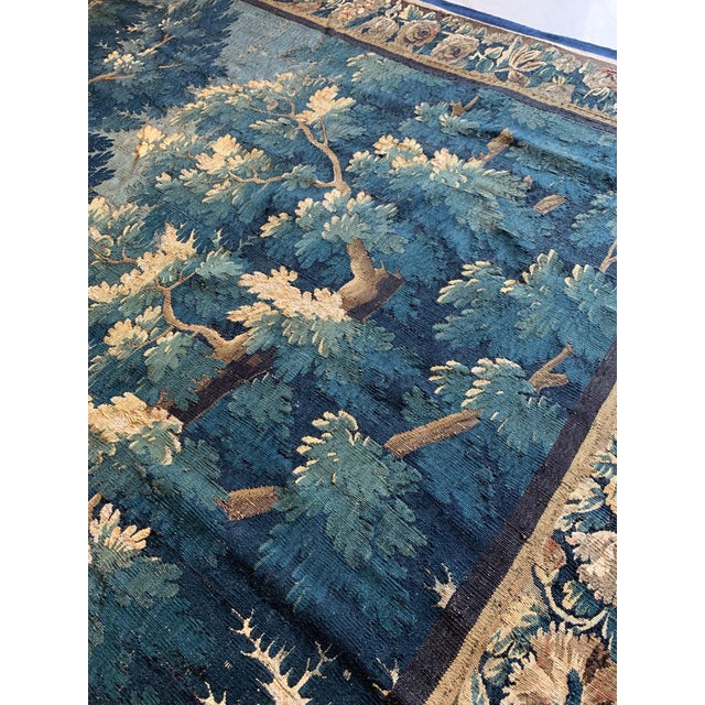 This is a gorgeous antique square 17th century flemish Verdure landscape tapestry without figures in a beautiful and rich...
