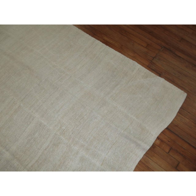 Ivory colored room size Turkish Kilim. 8'5'' x 11'10''