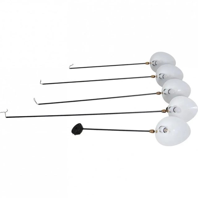 Serge Mouille five-armed spider lamp with steel arms. The lamp is from 2013 and appears in great condition with minimal...