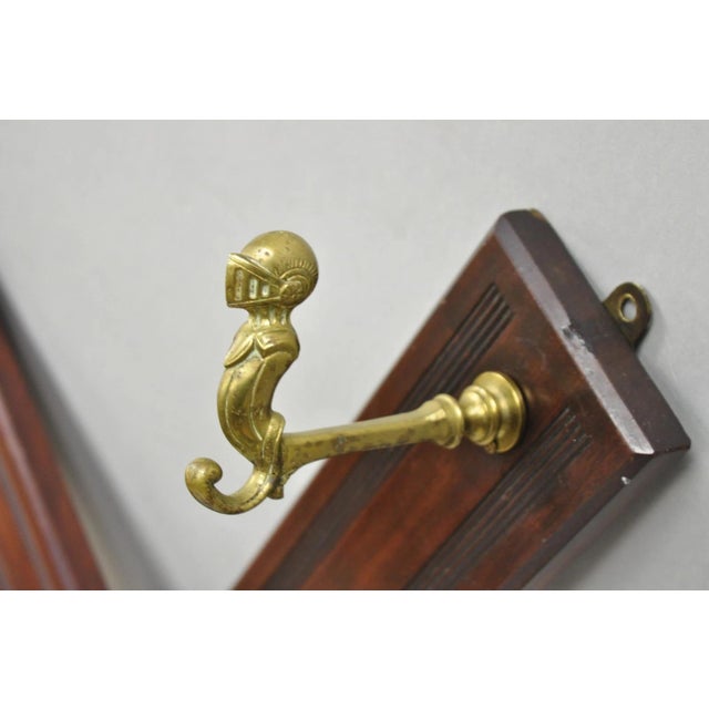Antique Victorian Renaissance Revival Mahogany X-Form Wall Hanging Coat Rack with (5) Brass Knight's Helmet Bust Hooks....