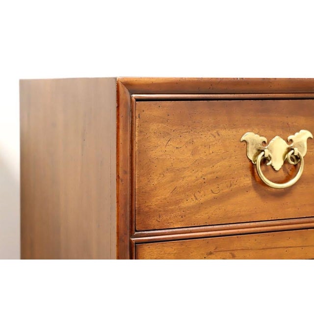 Chinoiseries style gentleman's chest by Henredon Fine Furniture. Rich warm mahogany with butterfly style brass hardware,...