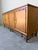Elegant vintage sideboard by Ficks Reed featuring a classic Palm Beach aesthetic with beautifully crafted faux bamboo...