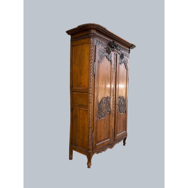 Antique French Normandy Oak Louis XV 2 Door Armoire. This exquisite armoire is a fine example of provincial French...