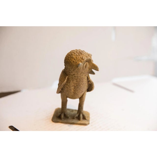 :: Vintage handmade African owl sculpture. Circa late mid 20th century, though possibly older, this piece has such...