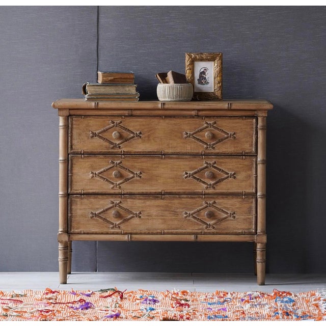 Neither too light nor too dark, the Faux Bamboo Dresser is the perfect median with its Antique Natural finish. Constructed...