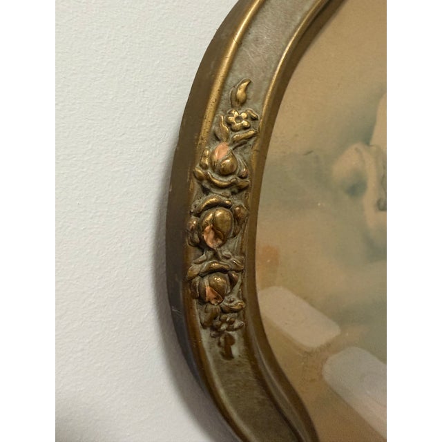 Sweet antique framed print of “Awakening” by beloved American illustrator Bessie Pease Gutmann, featuring an ethereal...