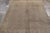 Originating from Turkey circa 1960-1970, this 7x10 vintage Oushak rug enjoys a luxurious, elegant color palette of gray...