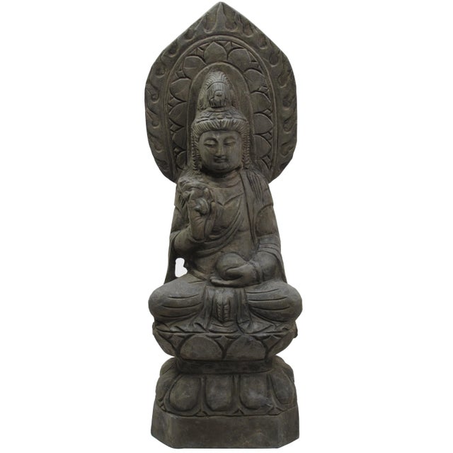 This seating Buddha's status is hand carved by the artisan from China. It measures 27" tall with great attention to...