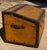 19th century wooden canted trunk with brass and iron fittings. Wonderful old paint. Slats have been added to the bottom of...