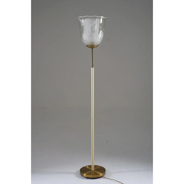 This majestic floor lamp by Bo Notini for Glössner, designed and crafted during the 1940s, is truly a work of art. This...