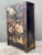 This monumental Chinese wedding cabinet is a captivating example of traditional lacquerware artistry, offering a rare...