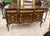 Magnificent French marquetry commode Louis XVI style. Stunning French commode. Has a beautiful gold details. This piece is...