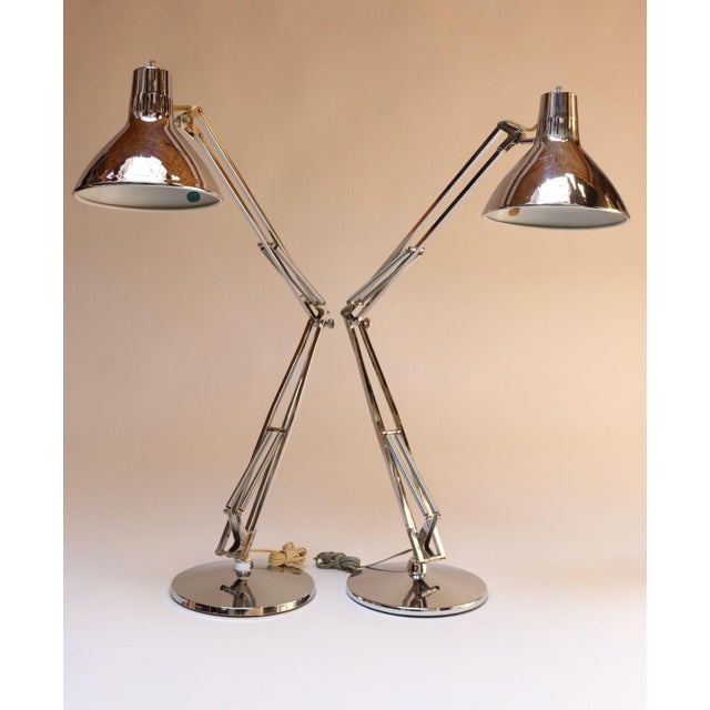 Pair of vintage Luxo articulating chrome desk/task lamps on weighted chrome bases originally designed in 1937 by Jac...
