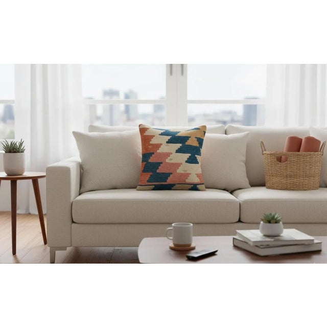 This beautiful 16x16 pillow cover is crafted from an authentic vintage kilim textile, handwoven with warm desert-inspired...