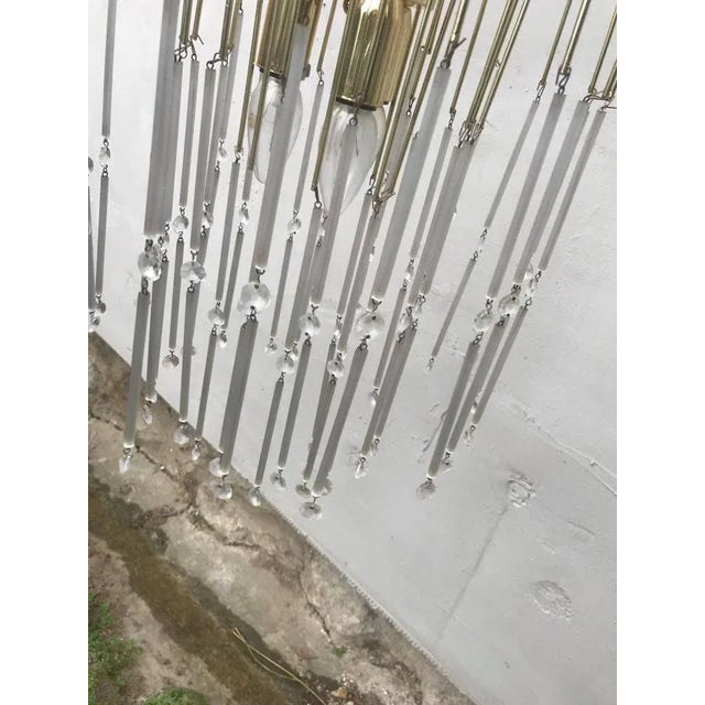 Brass chandelier with Murano glass ornaments from the 1970s. European Plug (up to 250V).The wiring of this item may be...