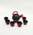 Rosolio set, designed by Napoleone Martinuzzi In black and red Murano glass Vintage 1970s Consisting of a black bottle...