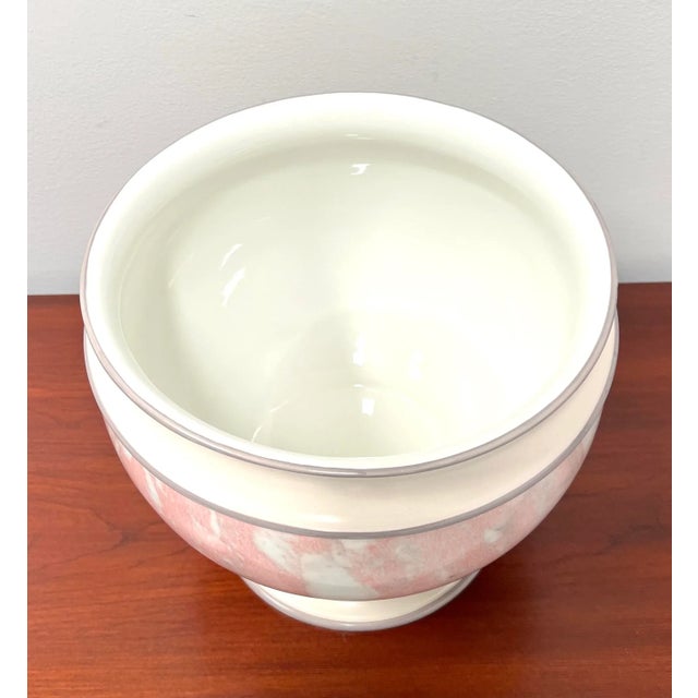 An Italian decorative porcelain centerpiece bowl, unbranded. A beautiful pink, white & gray color round porcelain bowl...