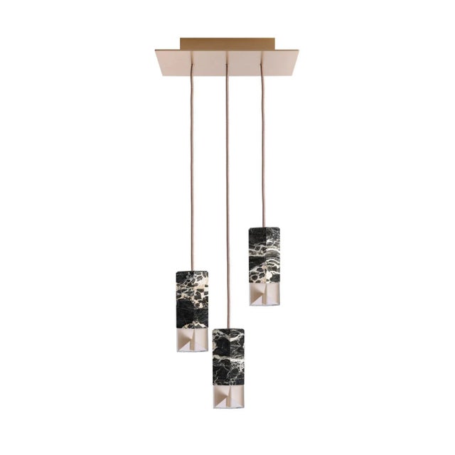 Lamp one 6-light chandelier in black marble by formaminima dimensions: h 93 x 30 x 30 cm materials: marble ultra-thin...