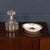 A stylish ceramic ashtray by gucci, crafted in italy in the late 20th century. The piece features a classic equestrian-...