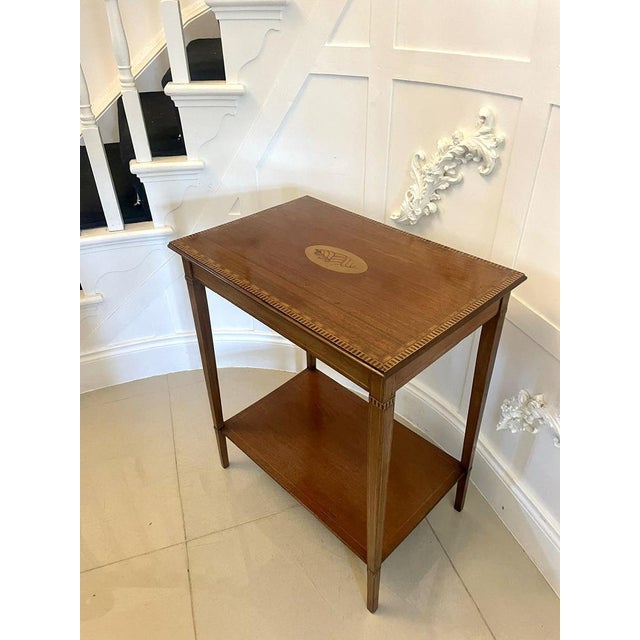 Antique Edwardian quality mahogany inlaid lamp table Having a quality mahogany rectangular shaped top crossbanded in...