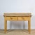 This characterful console table from circa 1930 is crafted from maple and pine wood and exudes an authentic, rustic look....