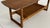 Stylish wooden bench in a deep dark brown. The cool, minimalist design contrasts beautifully with the warmth of the wood....