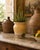 A hand thrown rustic glazed confit pot that has come from a home in France. It dates from the 19th century and shows its...