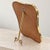 An elegant Italian table mirror from the 1950s, crafted from brass and attributed to Gio Ponti, featuring a highly iconic...