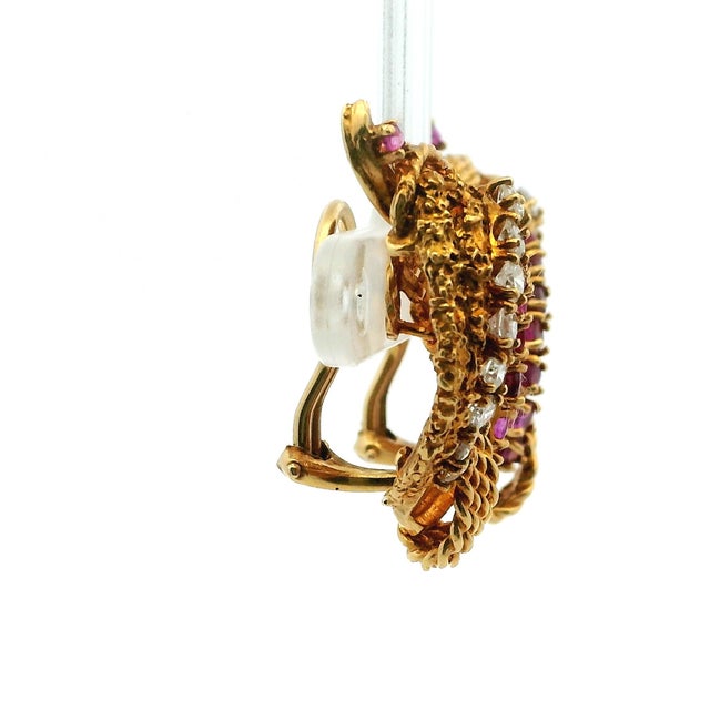 A beautiful pair of vintage Cherny earrings crafted in 18-karat yellow gold, featuring a richly textured sculptural design...