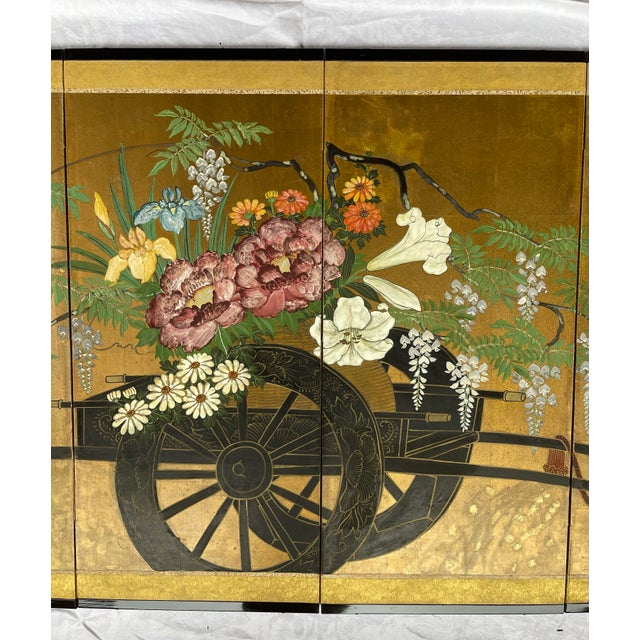 A beautiful and colorful 4 panel folding screen; Japanese hand painted on gold-leaf-like paper. This Byobu screen depicts...