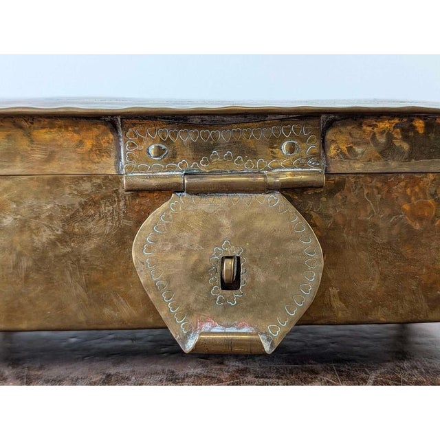 A distinctive Dutch table tobacco casket dating from the mid-19th century, constructed in wood and extensively clad in...