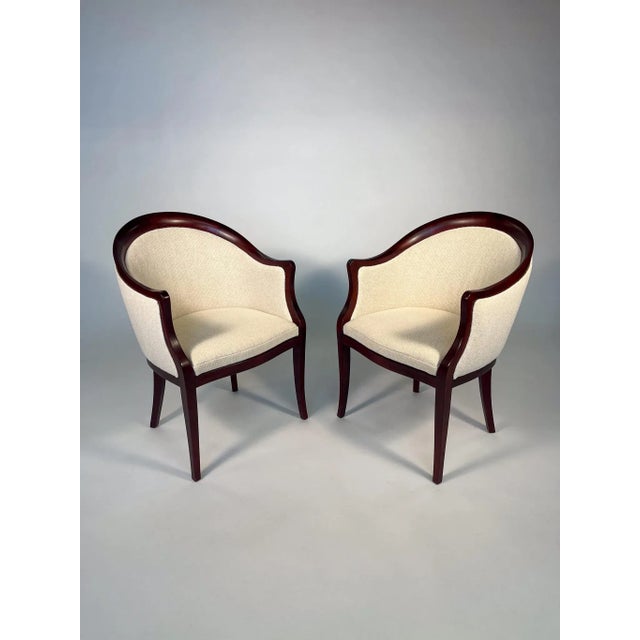 Beautiful set of four lounge chairs by Jack Lenor Larsen Furniture, Inc., New York. These chairs feature curved hardwood...