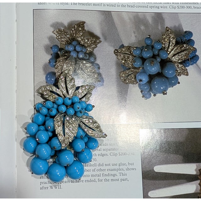 1939 to early 1940s pot metal leaves with round clear rhinestones and turquoise glass beads hand strung dangles on a...