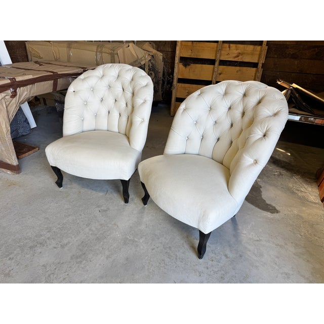 An exceptional, true antique pair of 19th-century French Napoleon III lounge/boudoir chairs (c. 1870). Historically...