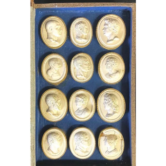 Beautifully preserved Grand Tour book-form box housing a collection of twenty-four classical Intaglio Medallions by...