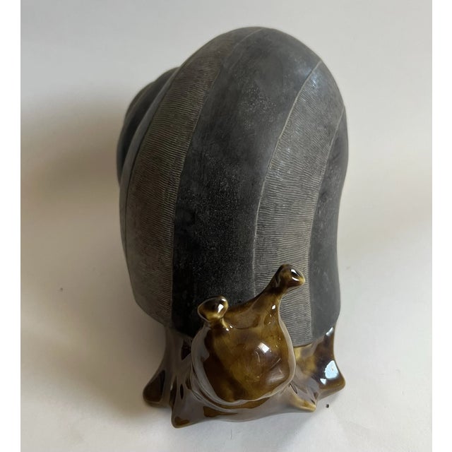 Add a charming piece of classic American pottery to your collection with this **Vintage Anthony Freeman McFarlin...