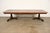 An exceptional Regency or Neoclassical style double pedestal extension dining table By Baker Furniture USA, Circa 1980s...