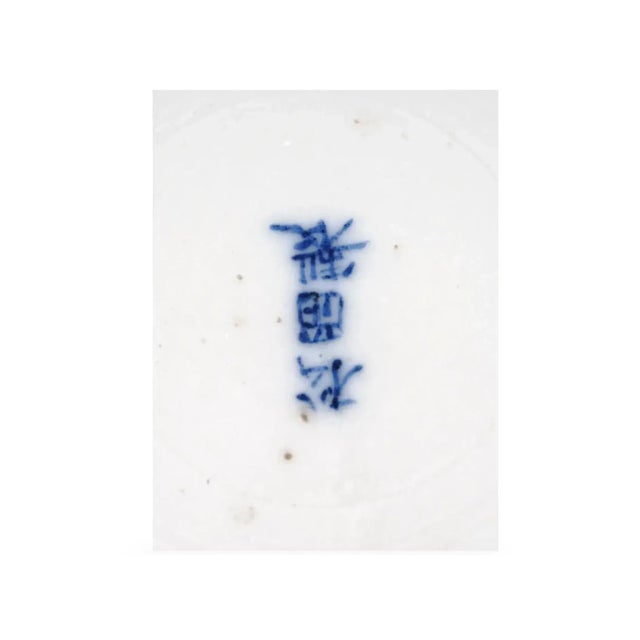 An antique Japanese enamel porcelain tea set. Features a captivating bird and floral design meticulously executed in the...