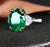 Contemporary GIA Certified Oval 5.72 Ct Green Emerald Platinum Cocktail Ring For Sale - Image 3 of 9