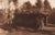 An original photogravure from Edward S. Curtis's The North American Indian. A Yuma House shows a low, brush-covered...