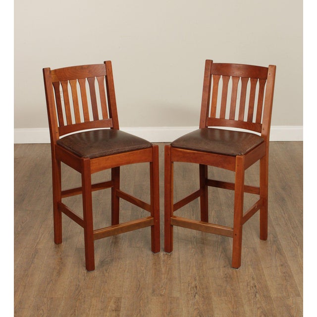 High Quality American Made Pair of Cherry Counter or Bar Stools with Leather Seats and Copper Kick Plates