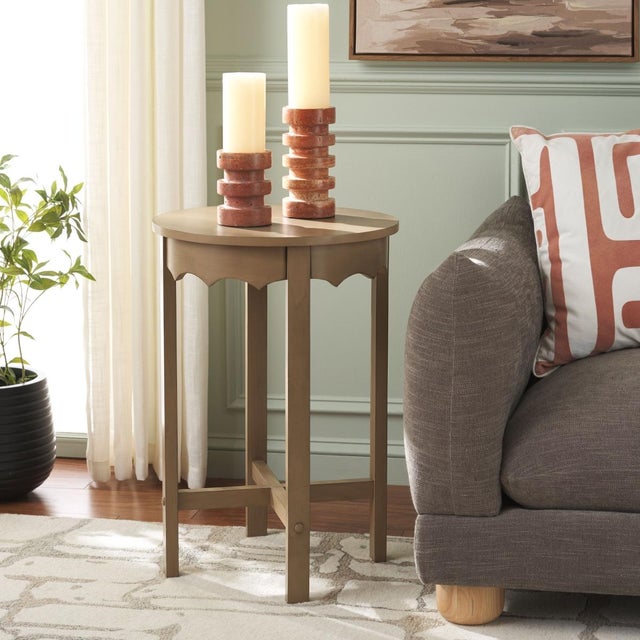 Discover the Seraphina Round Accent Table in a soothing brown color, designed to enhance your living space with effortless...