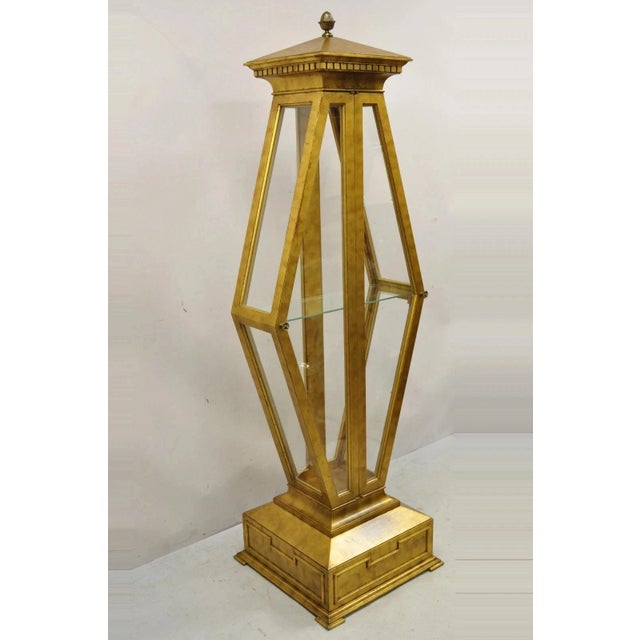Vintage Hollywood Regency Gold Gilt Diamond Shaped Etagere Curio Display Cabinet. Item features a burnished gold...
