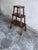 A charming set of three solid oak nesting tables dating from the mid-20th century. Featuring a warm dark oak finish,...