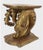 An expressive antique Rococo-style giltwood fragment, originally part of a larger console or pedestal table form. This...